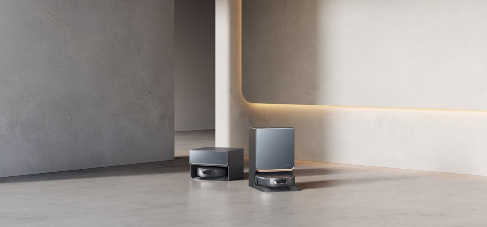 Black Narwal Flow 2 robot vacuum and dock in a minimal room